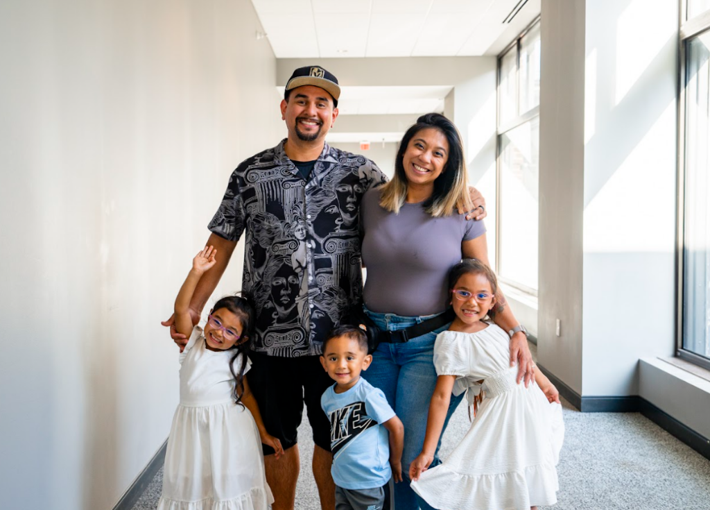 Mr. and Mrs. Gonzales with their three kids