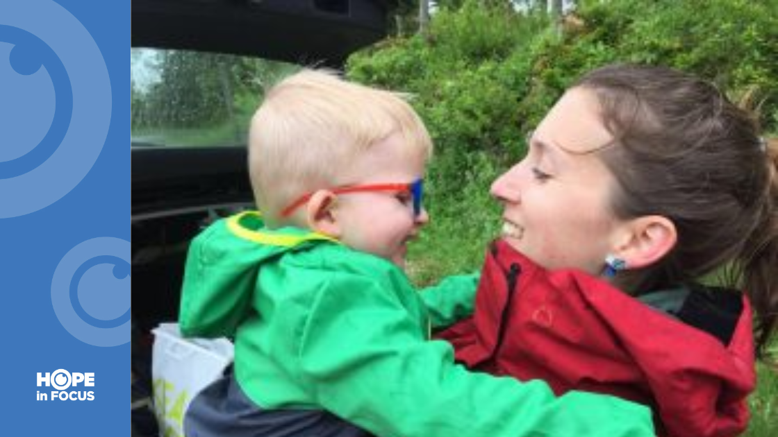 Mom and Enzo wearing rain coats