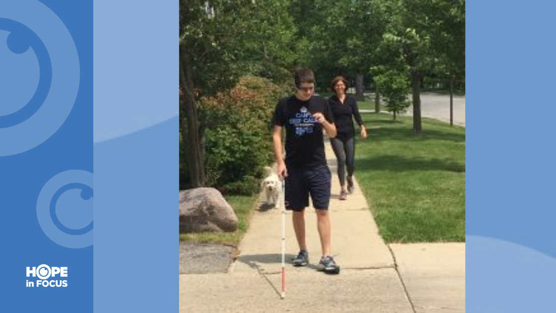 Alan Brint, who is blind, is trailed by his mother Betsy and his dog Mo, tries out his new Aira glasses.