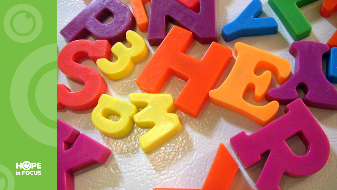Letter magnets on a white fridge