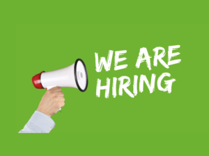 Green background with white text saying "We are hiring" with a microphone
