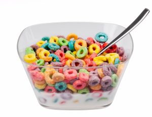 Fruit loops cereal on white background