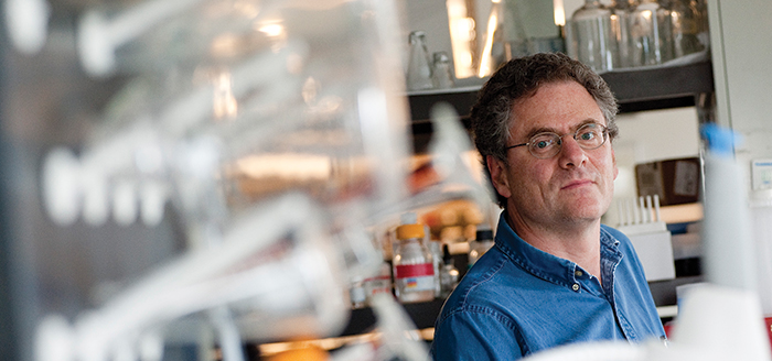 Dr. Eric Pierce headshot in a lab
