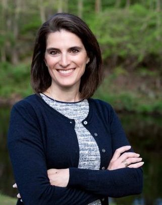 Cristin McCarthy Vahey wearing a blue cardigan.