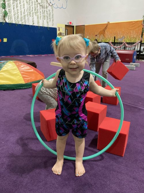 Dylan with a Hula hoop at the gym