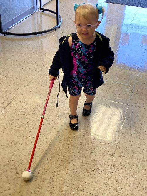 Dylan using her cane